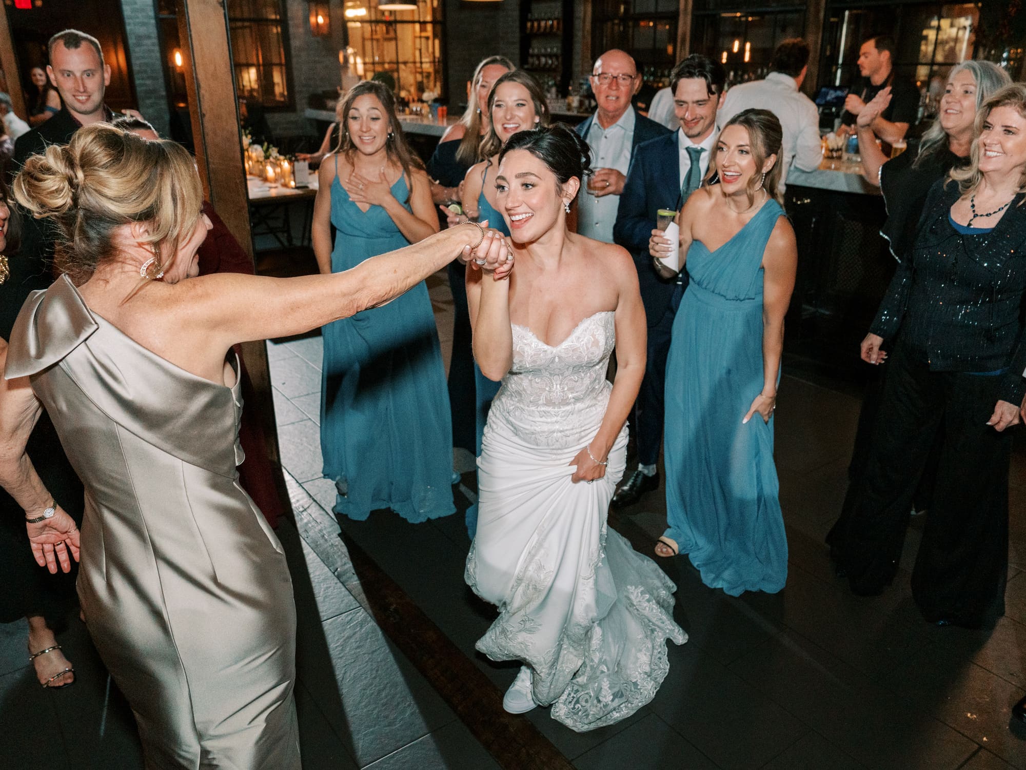 Two guests sharing a dance at the celebration
