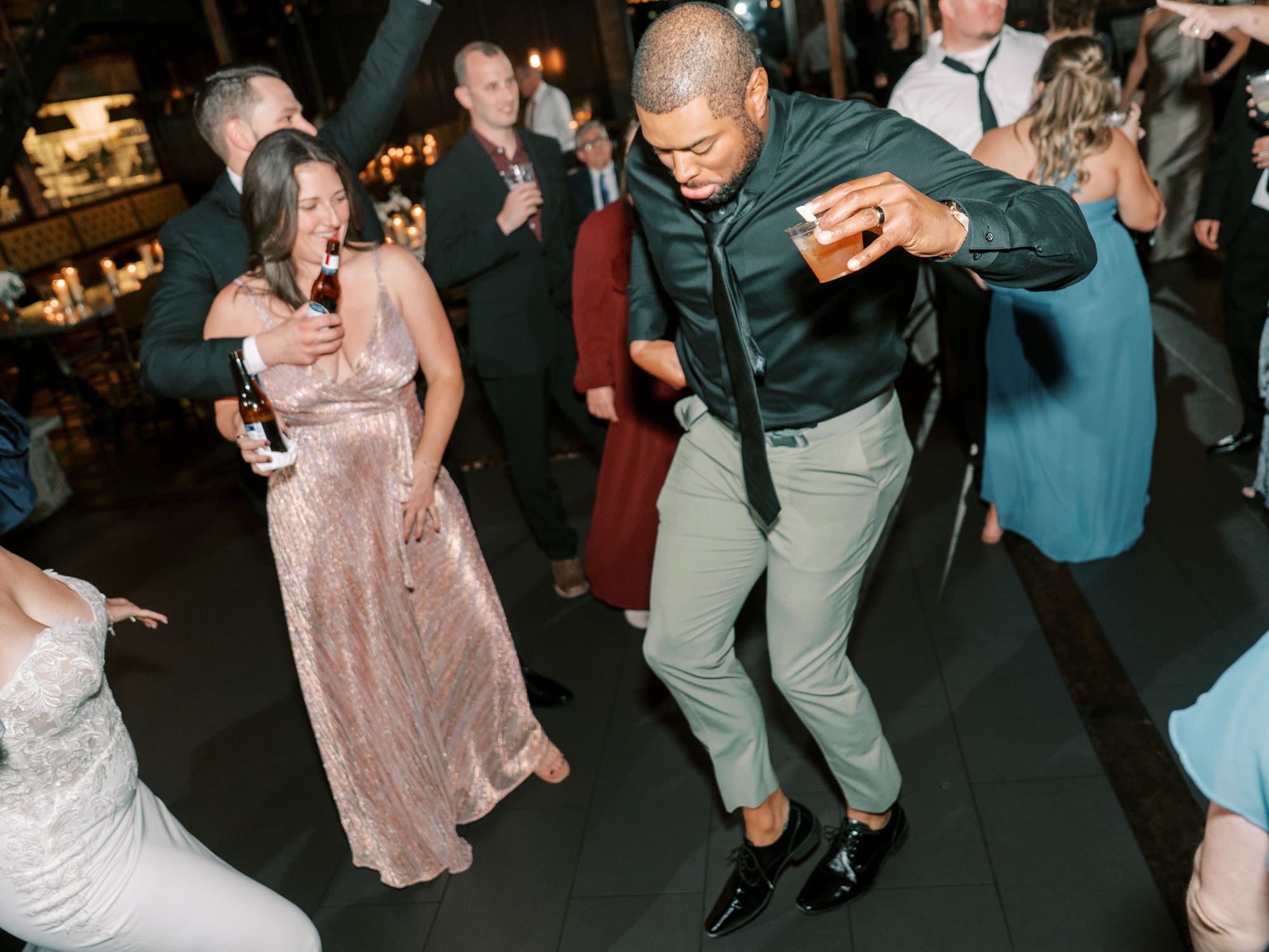 Guests dancing together during cocktail hour